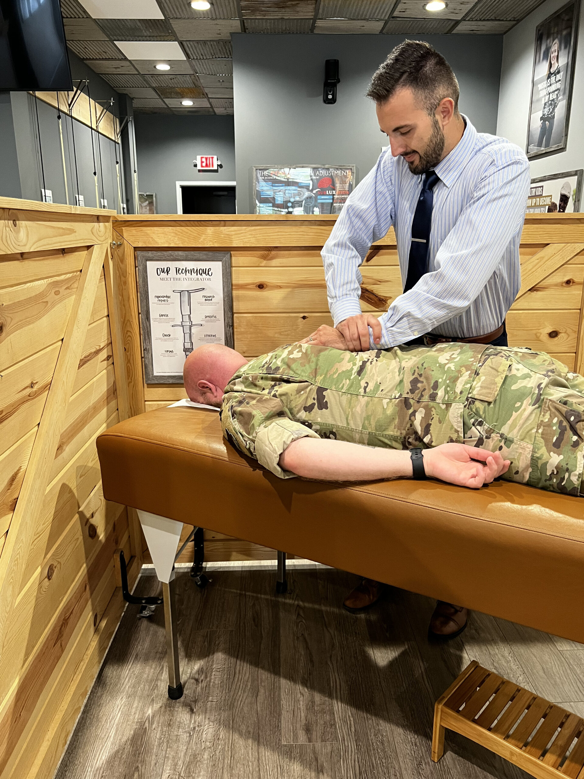 Chiropractor treating a patient's soft tissue injury