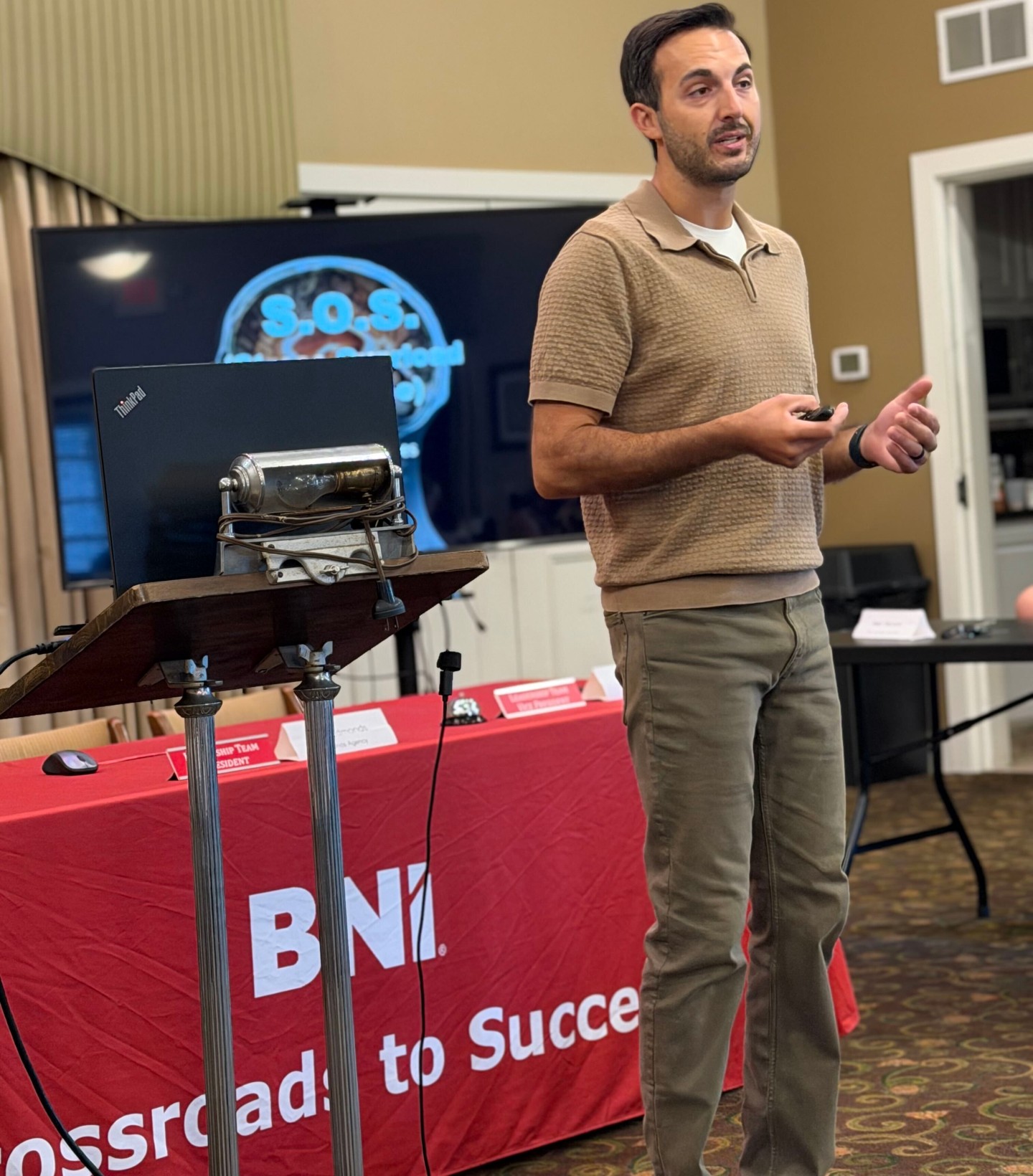 Dr. John Toenjes presenting at BNI Crossroads to Success